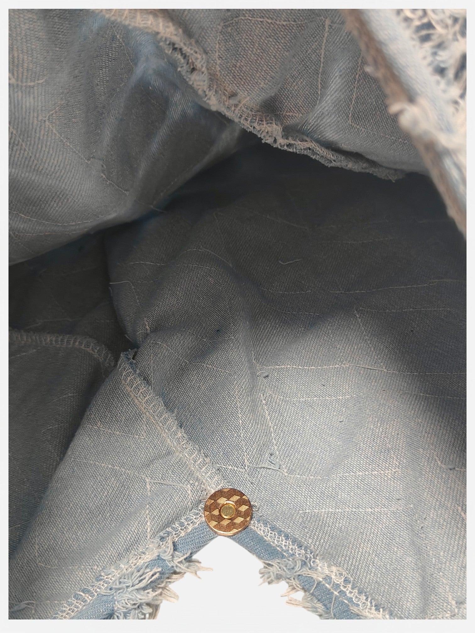 Teresa-Borsa a spalla in denim con dettaglio della chiusura e interno sfoderato